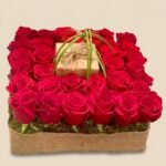 GIFT ARRANGEMENT WITH RED ROSES
